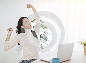 Beautiful woman working on a laptop. freelancer,work from home concept