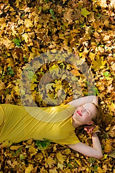 Beautiful woman - yellow autumn leaves - fall