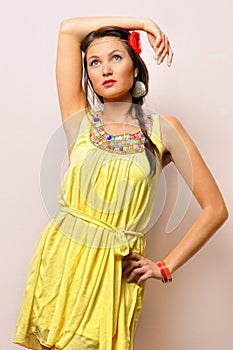 Beautiful woman in a yellow dress.