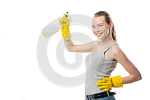 Beautiful woman in yellow rubber gloves over white