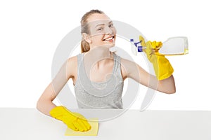 Beautiful woman in yellow rubber gloves over white