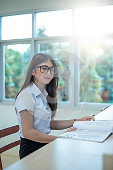 Beautiful women asian university student in library