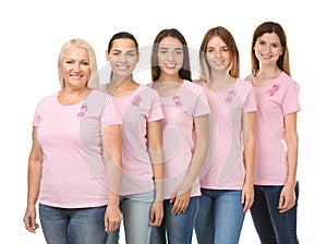 Beautiful women of different ages with pink ribbons on white background. Breast cancer concept