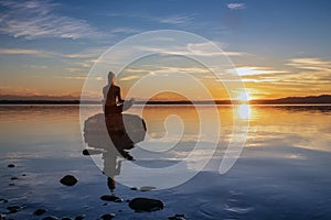 Beautiful women girl are sitting on a stone