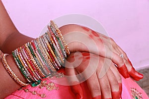 Beautiful women hands with colorful bangels