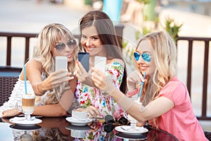 Beautiful women, photographing a phone