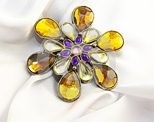 Beautiful women`s vintage brooch, with bright natural crystals