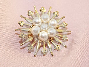 Beautiful women`s vintage gold brooch, with bright natural pearls