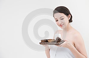 Beautiful women in spa with aroma herbal scent