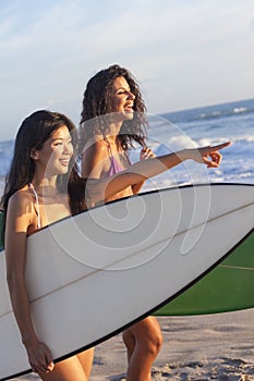 Beautiful Women Surfers & Surfboards At Beach