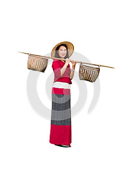 Beautiful women in Thai dress carry basket on shoulder