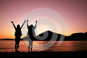 Beautiful women walking and having fun on the beach