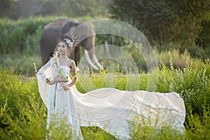 Beautiful women wearing white elephant village,Surin,Thailand