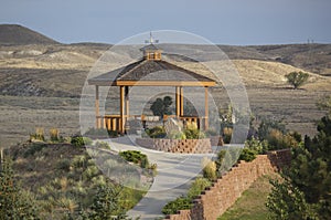 Beautiful wood gazebo with rolling hills in background