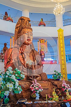 Beautiful wood statue of Guan Yin at Huay Pla Kang Temple, Chiang Rai, Thailand. Guan Yin is a female Bodhisattva in Thai Buddhism