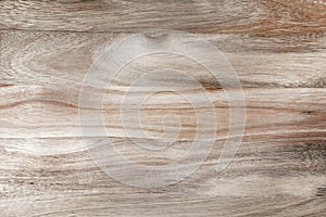 Beautiful wooden background of transversely carved wood with a pattern of rings