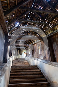 The beautiful wooden covered staircase at the Saxon UNESCO World Heritage Site of Biertan Fortified Church. Biertan, Sibiu Count