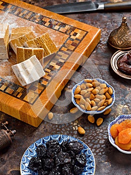 Beautiful wooden cutting board with cut pieces of pastila from baked apples