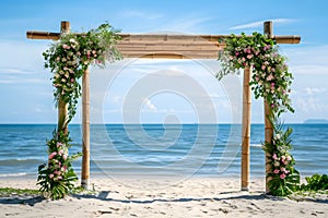 Beautiful wooden decorative arch with flowers and walkway on the beach for wedding ceremony