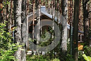 Beautiful wooden house among the trees in the resort