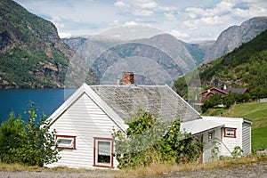 beautiful wooden houses in Flam village at majestic Aurlandsfjord