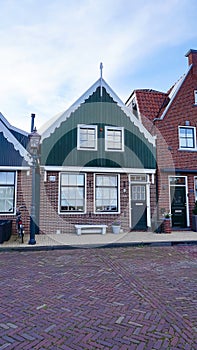 Beautiful wooden houses. Typical small Dutch houses facades in Volendam, Netherlands photo