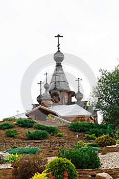 A beautiful wooden temple. Vertical photo