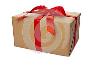 Beautiful wrapped gift box with red ribbon and bow on white background. Present for Christmas, top view