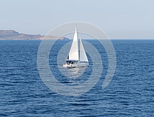 Beautiful yachts on calm Aegean Sea on Mykonos island in Greece