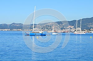 Beautiful yachts on a sparkling blue sea in Cannes, France