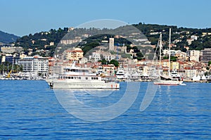Beautiful yachts on a sparkling blue sea in Cannes, France