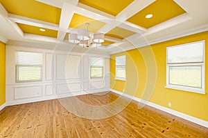 Beautiful Yellow Custom Master Bedroom Complete with Entire Wainscoting Wall, Fresh Paint, Crown and Base Molding, Hard Wood photo