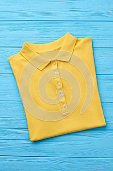 Beautiful yellow polo t-shirt isolated.