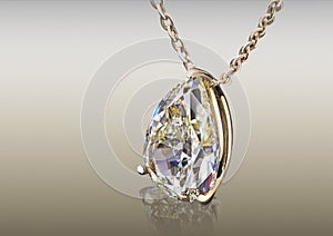 Beautiful yellow shape pear cut diamond pendant isolated on abstract background