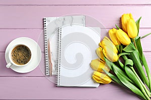 Beautiful yellow tulips and accessories on background. Blogging concept