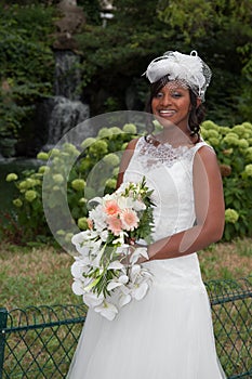 Beautiful young African american bride wearing a dress