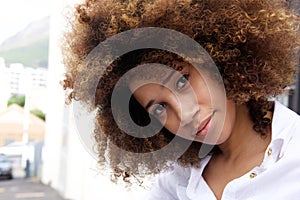 Beautiful young african american woman with afro