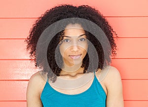 Beautiful young african american woman with curly hair