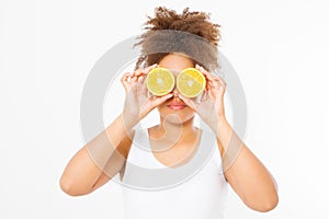 Beautiful young african american woman isolated on white background. Afro girl and diet concept. Orange fruit. Mock up. Skin care