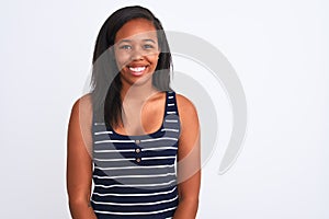 Beautiful young african american woman wearing summer t-shirt over isolated background with a happy and cool smile on face