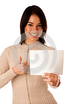 Beautiful young asian caucasian woman holding a blank card