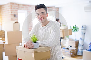 Beautiful young asian couple looking happy, handsome man smiling excited moving to a new home