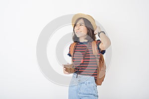 Beautiful young asian tourist woman happy on white background studio