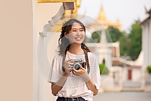 Beautiful young Asian tourist woman on vacation sightseeing and exploring Bangkok city, Thailand, Holidays and traveling concept