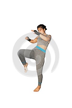 Beautiful young Asian white girl practice Muay Thai boxing by kicking at sport fitness club on isolated with clipping path.