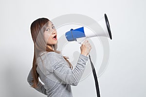 Beautiful young Asian woman announce with megaphone