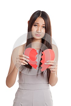 Beautiful young Asian woman with broken heart