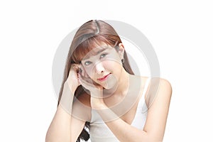 Asian Beautiful model. Beautiful Smiling girl under splash of water with fresh skin on white background