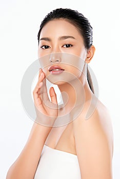 Beautiful Young Asian Woman with Clean Fresh Skin. Face care, Facial treatment, Cosmetology, beauty and healthy skin and cosmetic