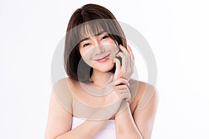 Beautiful Young Asian Woman with Clean Fresh Skin. Face care, Facial treatment, Cosmetology, beauty and healthy skin and cosmetic